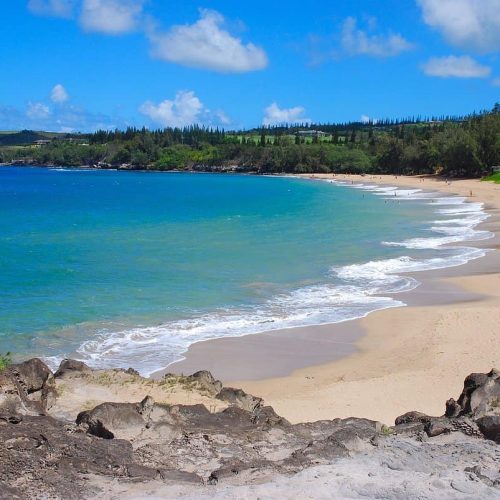 visiting fleming beach is one of the best things to do in maui with kids!
